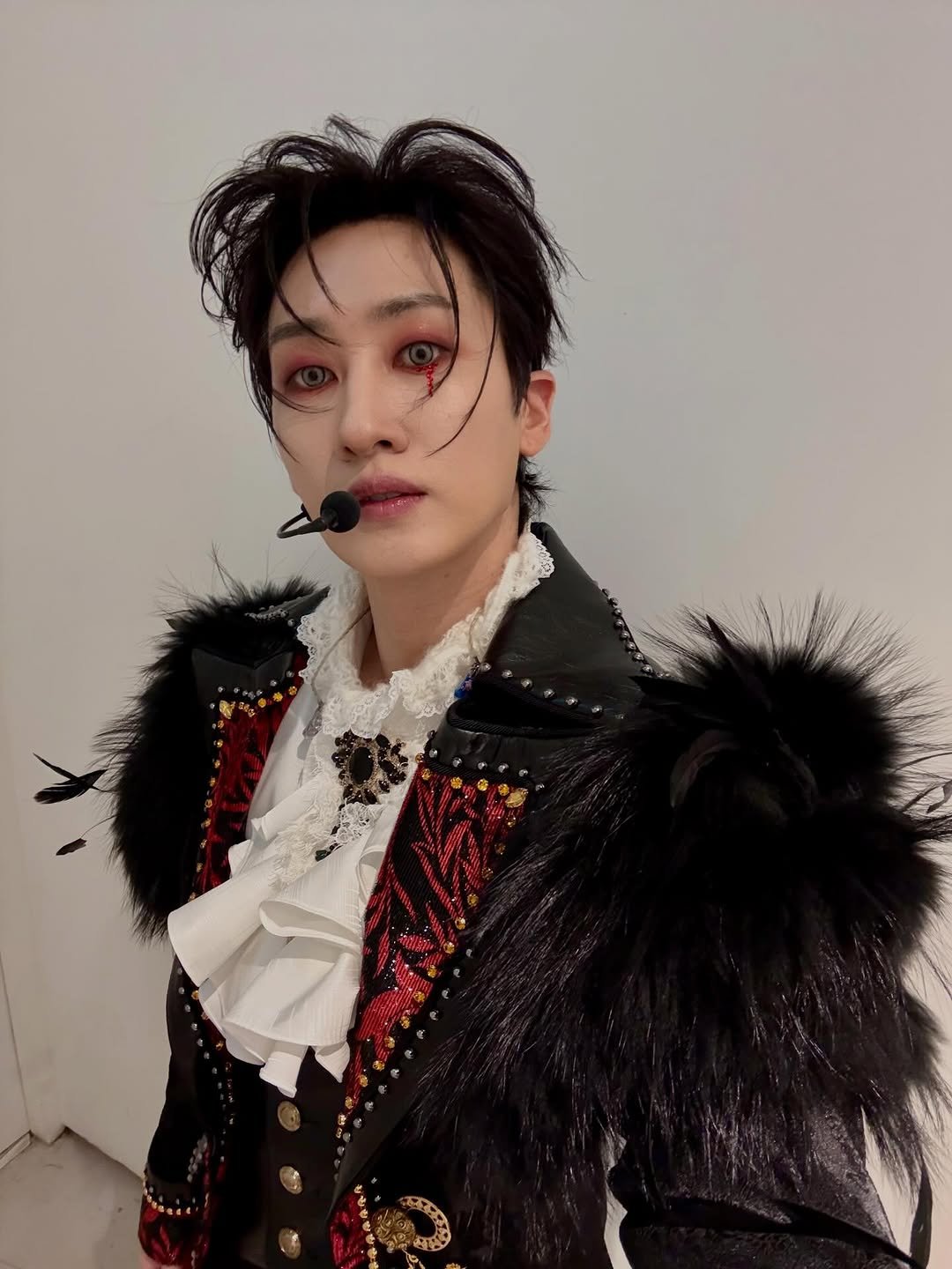 Photo by EUNHYUK on April 09, 2026. May be an image of one or more people, hair, bolo tie and text.