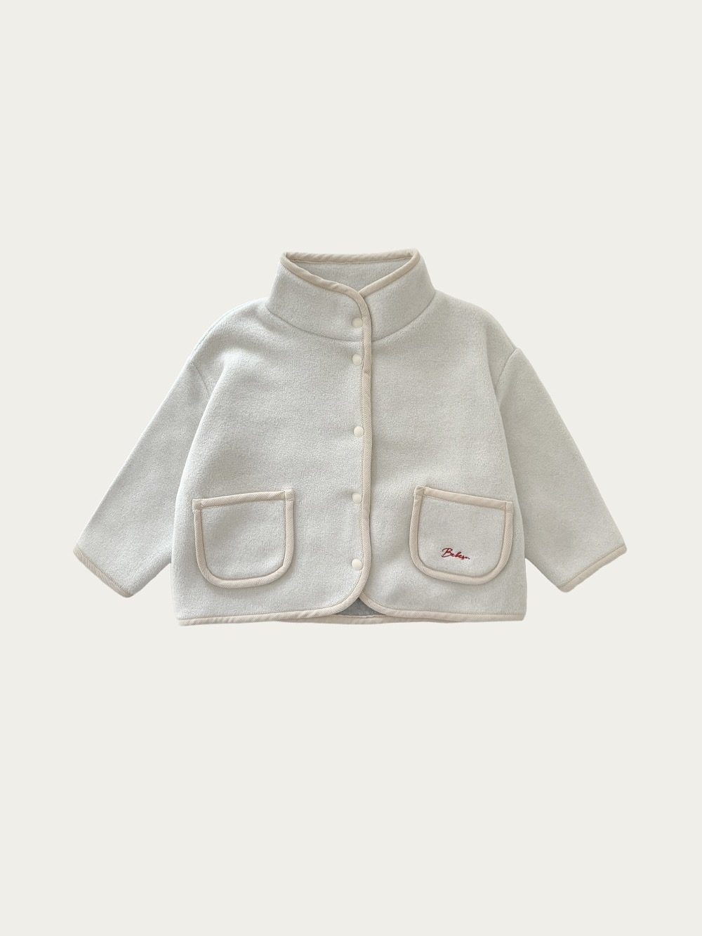 Photo by 베베소유 B̲B̲ㅣ아동복 on October 04, 2025. May be an image of duffle coat, fleece, jacket, cardigan and text.