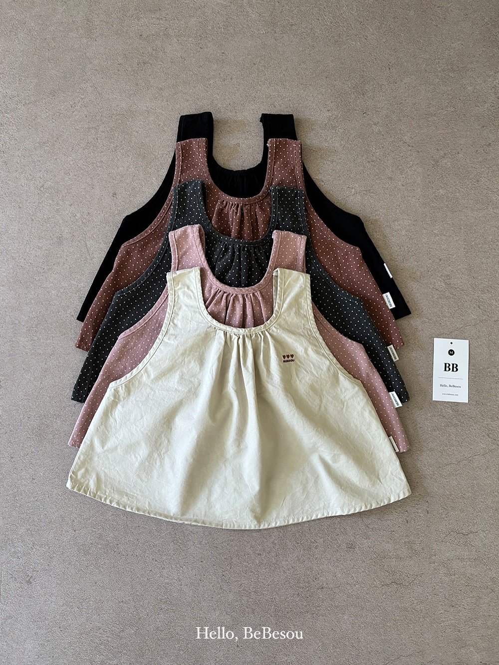 Photo by 베베소유 B̲B̲ㅣ아동복 on August 13, 2025. May be an image of apron, dress, halter top, vest, sundress and text.