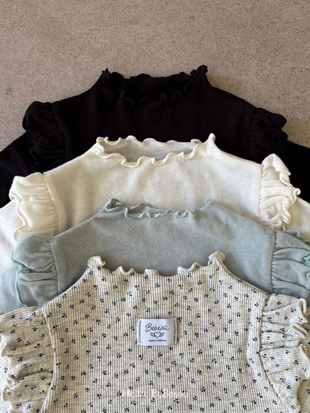 Photo by 베베소유 B̲B̲ㅣ아동복 on August 13, 2025. May be an image of cardigan and text.