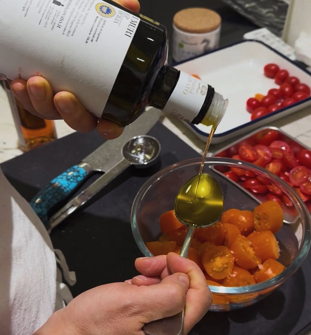 Photo shared by BELLELEAH on December 20, 2025 tagging @503recipe. May be an image of condiment, olive oil, tomato and text.