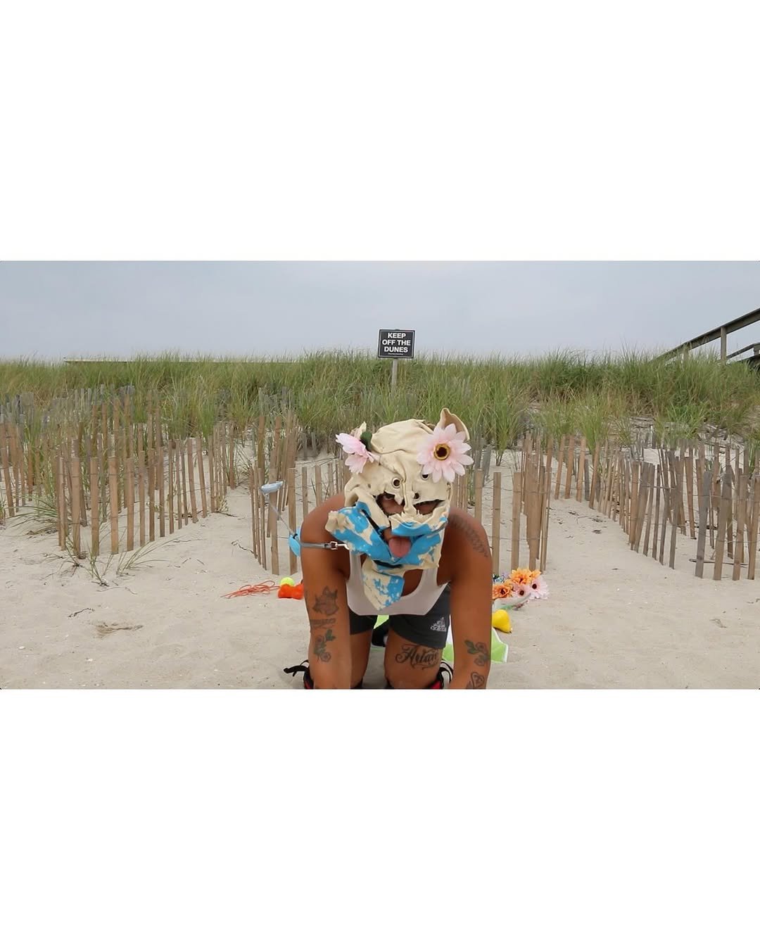 Photo shared by Below Grand Gallery on January 17, 2026 tagging @aigerimakh. May be an image of headdress, beach ball, glasses and text.