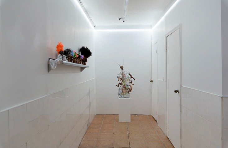 Photo shared by Below Grand Gallery on December 19, 2025 tagging @_terrancejames_, and @mosmosk. May be an image of flower arrangement, hallway and text.