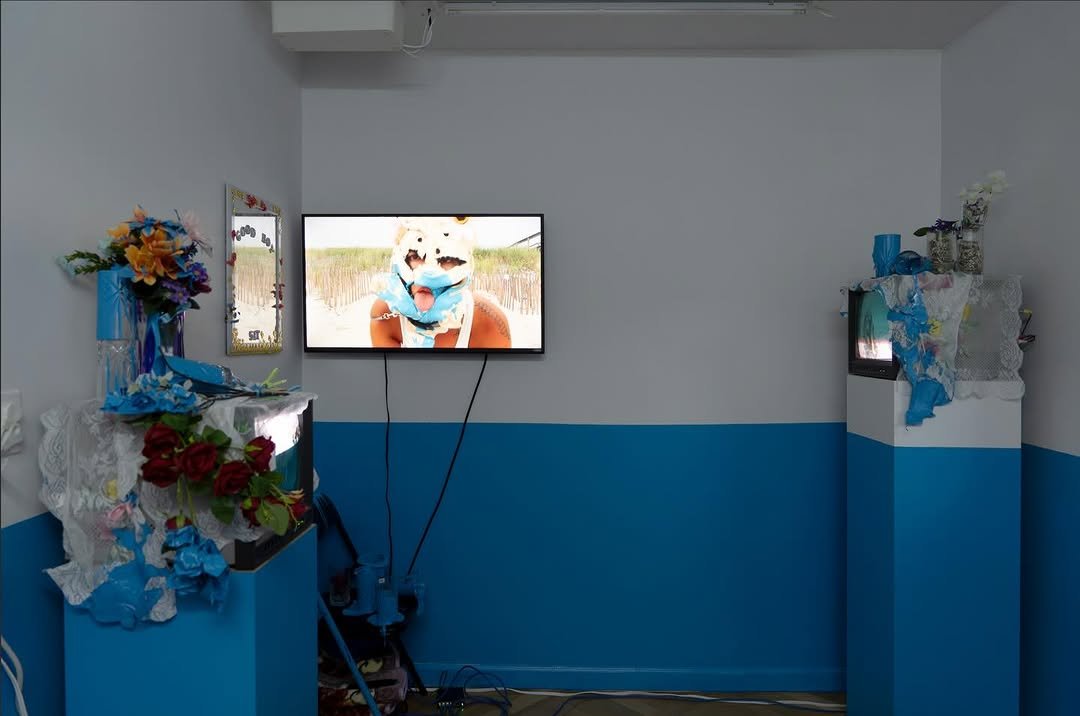 Photo shared by Below Grand Gallery on January 29, 2026 tagging @hwinx, and @aigerimakh. May be a cartoon of television, office and text.