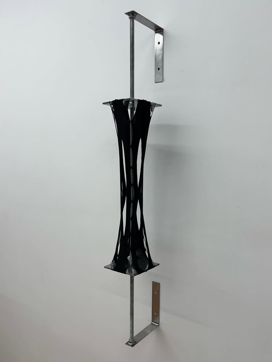 Photo shared by Below Grand Gallery on September 18, 2025 tagging @p.ete.rk.ell.y, and @tcaro_studio. May be an image of candle holder, coat rack, rack and text.