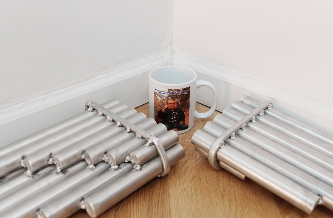 Photo shared by Below Grand Gallery on November 29, 2025 tagging @heavymetalcurator. May be an image of childrens toy, towel rack, wrench, rack, shot glass, mug and text.