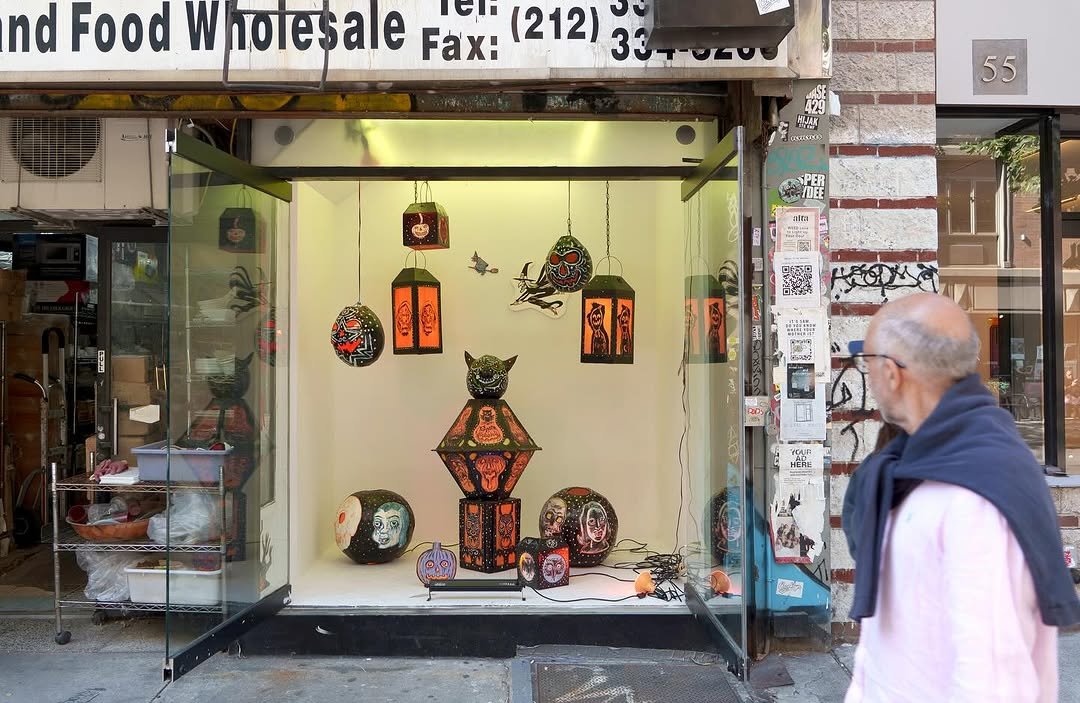 Photo by Below Grand Gallery on October 25, 2025. May be an image of signboard, display case, newsstand and text.