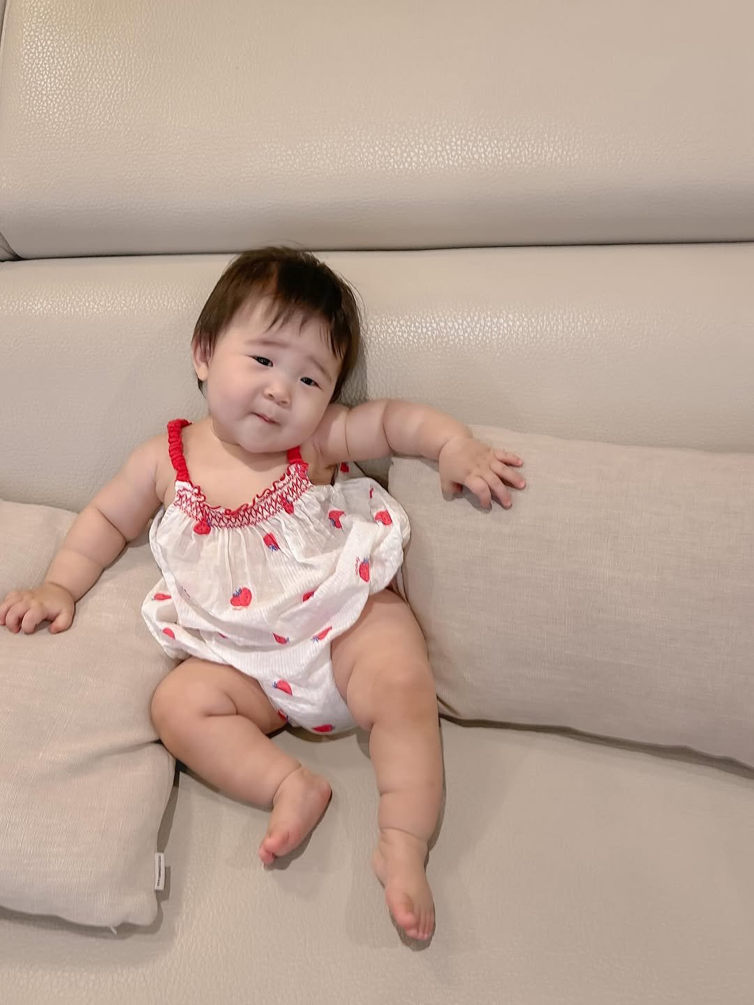 Photo by 김수현  딸기엄마🍓 on August 15, 2025. May be an image of 1 person, baby, sleepwear and text.