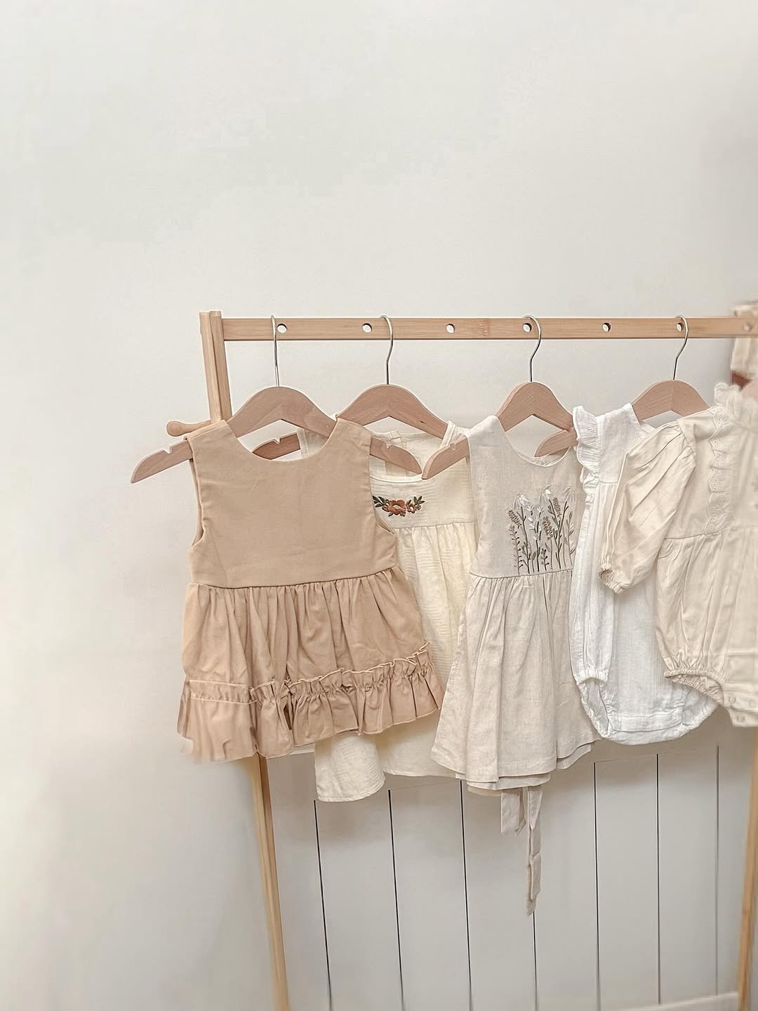 Photo by 김수현  딸기엄마🍓 on August 10, 2025. May be an image of overskirt, rack and text.