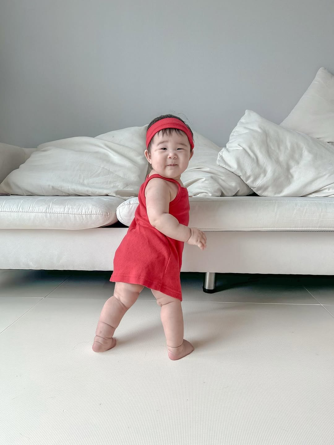 Photo by 김수현  딸기엄마🍓 on July 17, 2025. May be an image of 1 person, baby, standing, diaper and text.