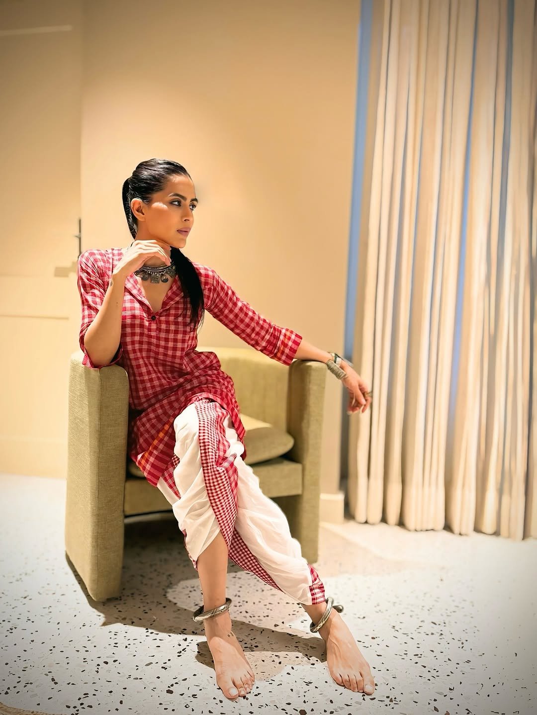 Photo by Bhavana Singh on August 25, 2025. May be an image of 1 person, sleepwear, dress, headscarf and text.