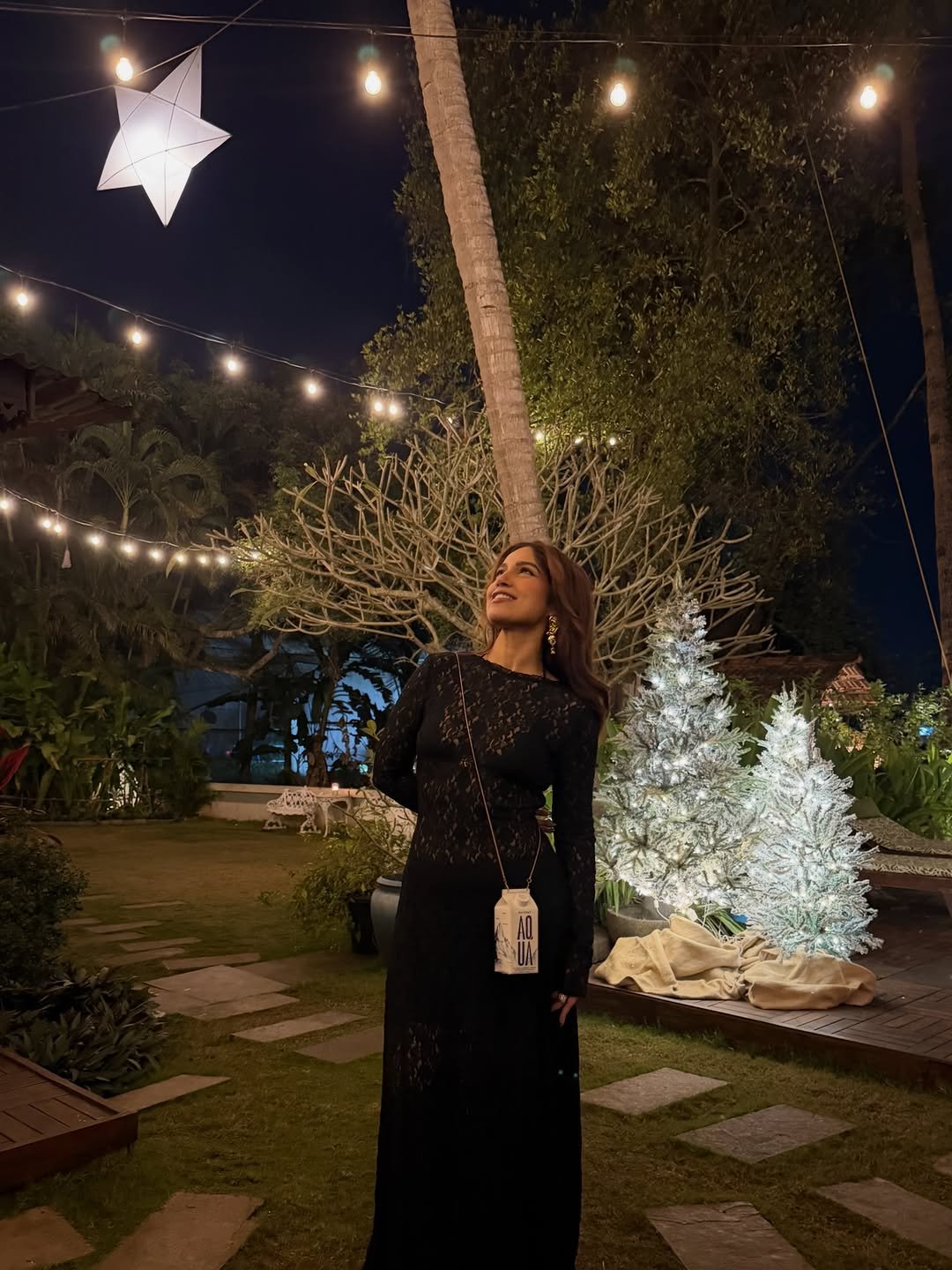 Photo by Bhumi Satish Pednekkar on January 02, 2026. May be an image of christmas tree, dress, night, outdoors and text.
