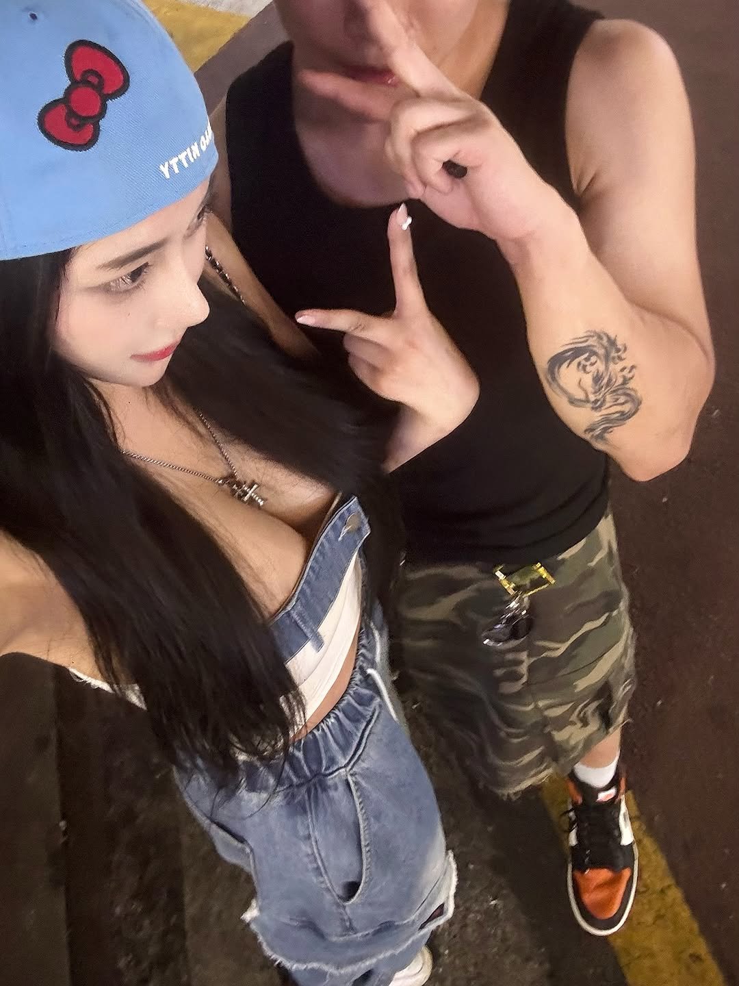 Photo by BIBI on July 30, 2025. May be an image of 1 person, hat, bandanna, shorts and text.