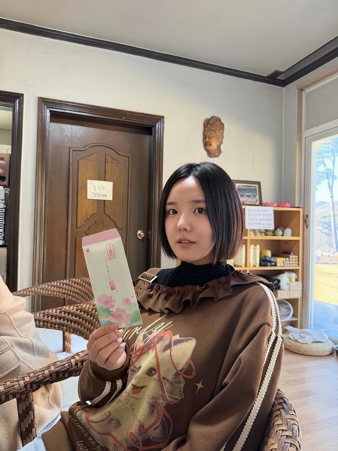 Photo by 은수좋은날 | EUNSOO on February 17, 2026. May be an image of one or more people, braids, turtleneck and text.