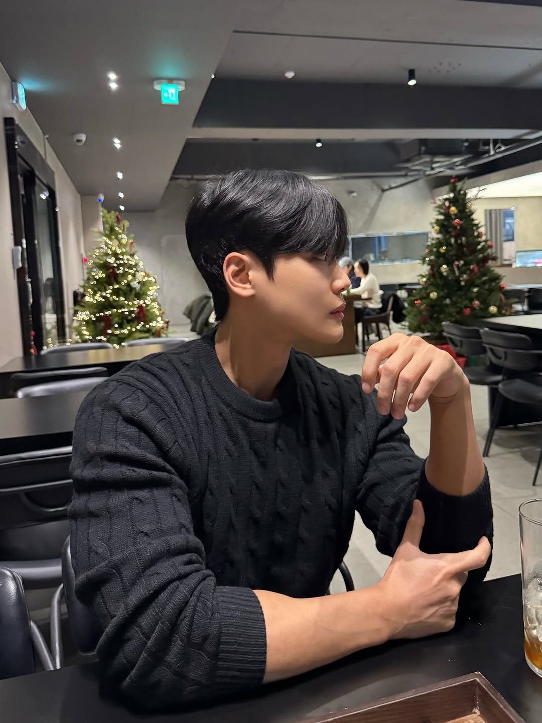 Photo by 지 우 on December 12, 2025. May be an image of one or more people, hair, turtleneck and text.