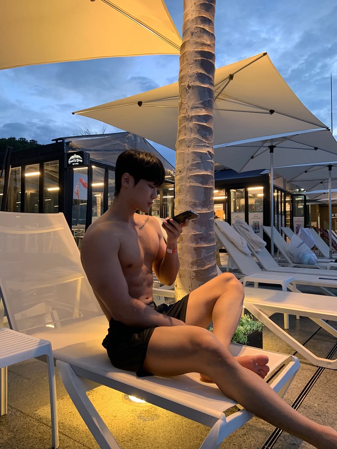 Photo by 지 우 on August 09, 2025. May be an image of 1 person, deck chair, pool, cabana, outdoors and text.