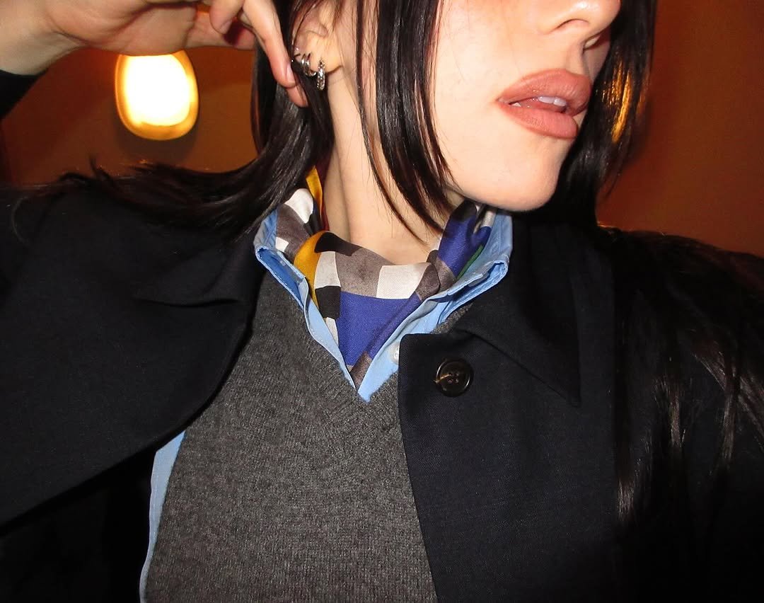 Photo by BILLIE EILISH on November 04, 2025. May be an image of scarf, bandanna, bolo tie and text.