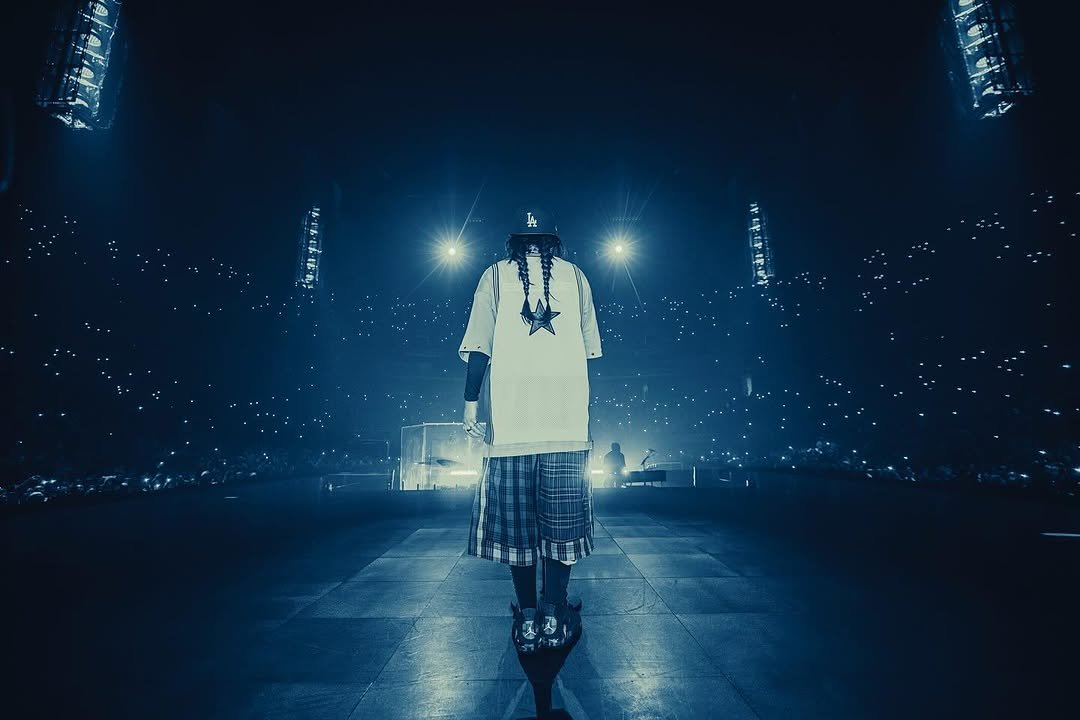 Photo shared by BILLIE EILISH on November 15, 2025 tagging @henryhwu. May be an image of kilt, crowd, concert and text.