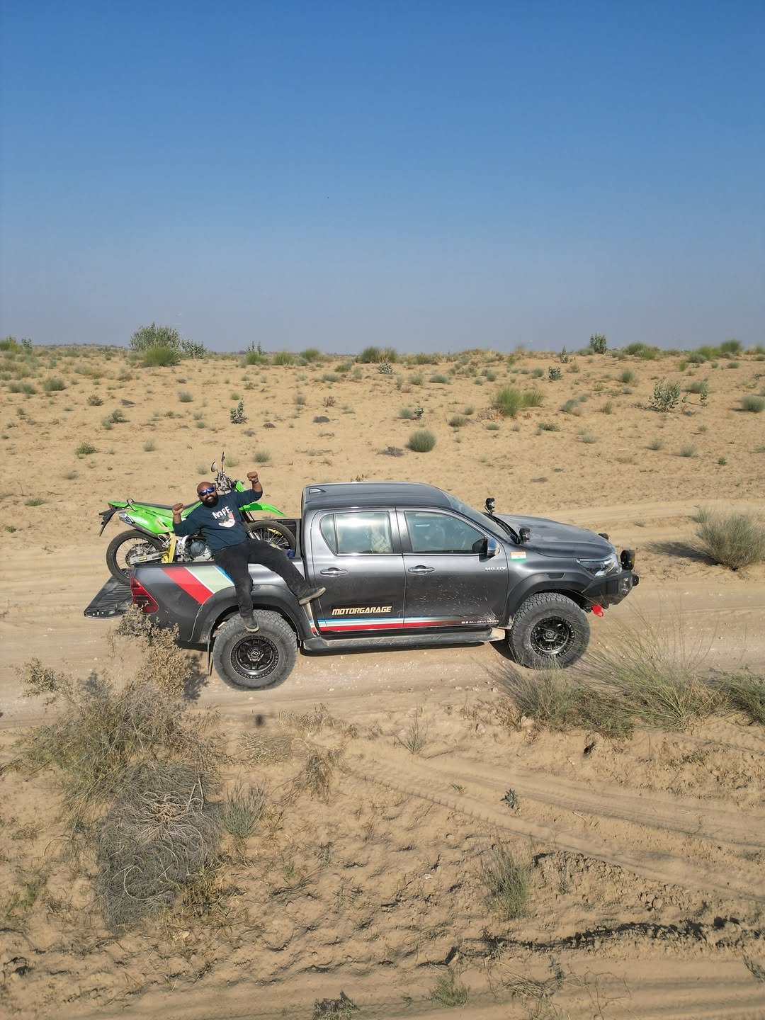 Photo by Inderdeep Singh on January 13, 2026. May be an image of jeep, motorcycle, truck and text.