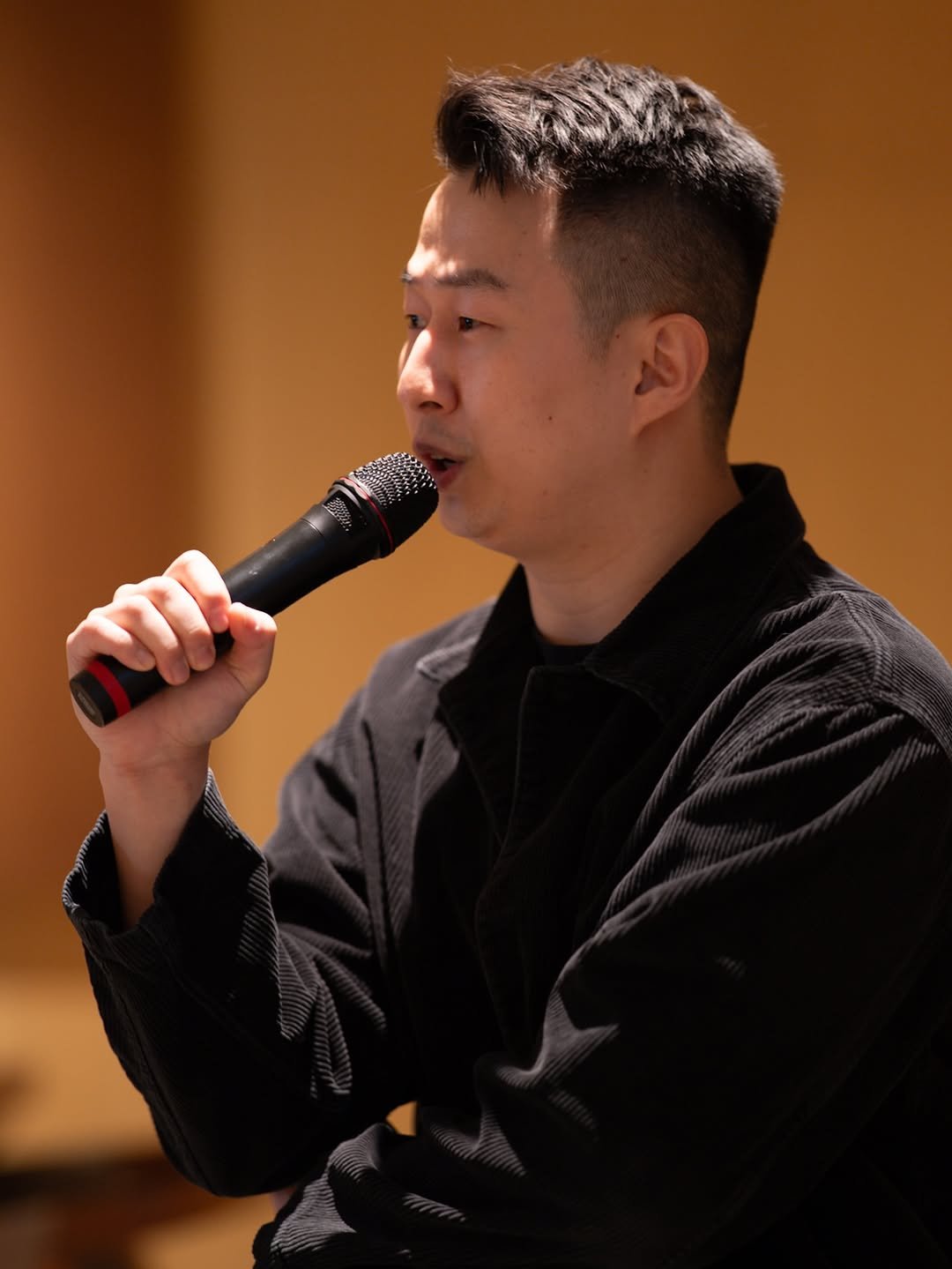 Photo shared by BZCF | 비즈까페 on February 08, 2026 tagging @youngkwon.kr, and @playaseoul. May be an image of microphone and text.