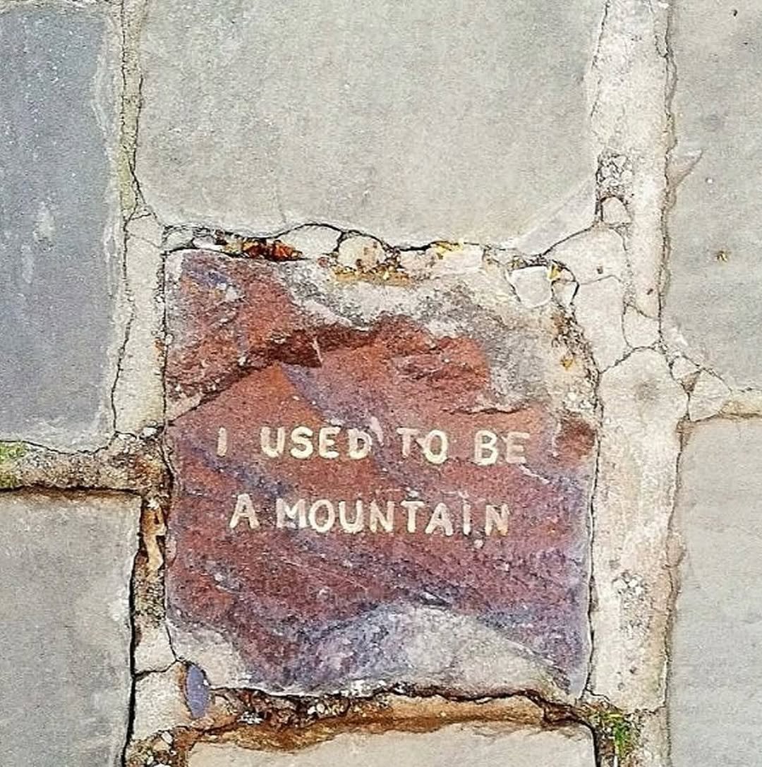 Photo by BZCF | 비즈까페 on August 22, 2025. May be an image of manhole and text that says 'I USEDTO ΤΟ BE A MOUNTAIN'.
