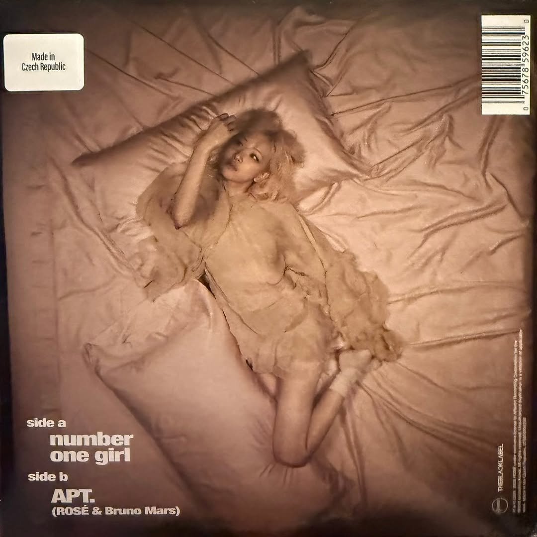 Photo shared by BLACKPINK | BLINK on November 14, 2025 tagging @urbanoutfitters, @theblacklabel, @blackpinkofficial, @jennierubyjane, @roses_are_rosie, @sooyaaa__, and @lalalalisa_m. May be an image of record and text that says 'Madein Czech Republic ENRA side a number one girl side b APT. (ROSÉ & (ROSE&BrunoMars) Bruno Mars) THEMAOKLABEL THEЛ'.