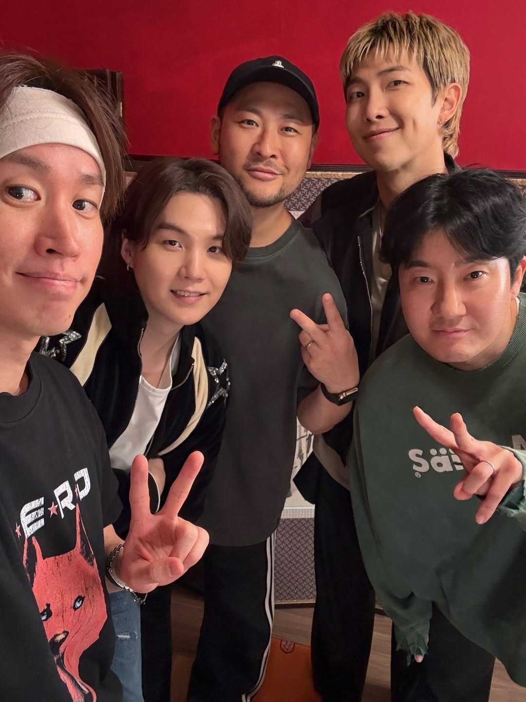 Photo shared by 에픽하이 타블로 | Tablo of Epik High on March 26, 2026 tagging @realmithrajin, @realtukutz, @bts.bighitofficial, @agustd, and @rkive. May be an image of one or more people, bangs, top and text.