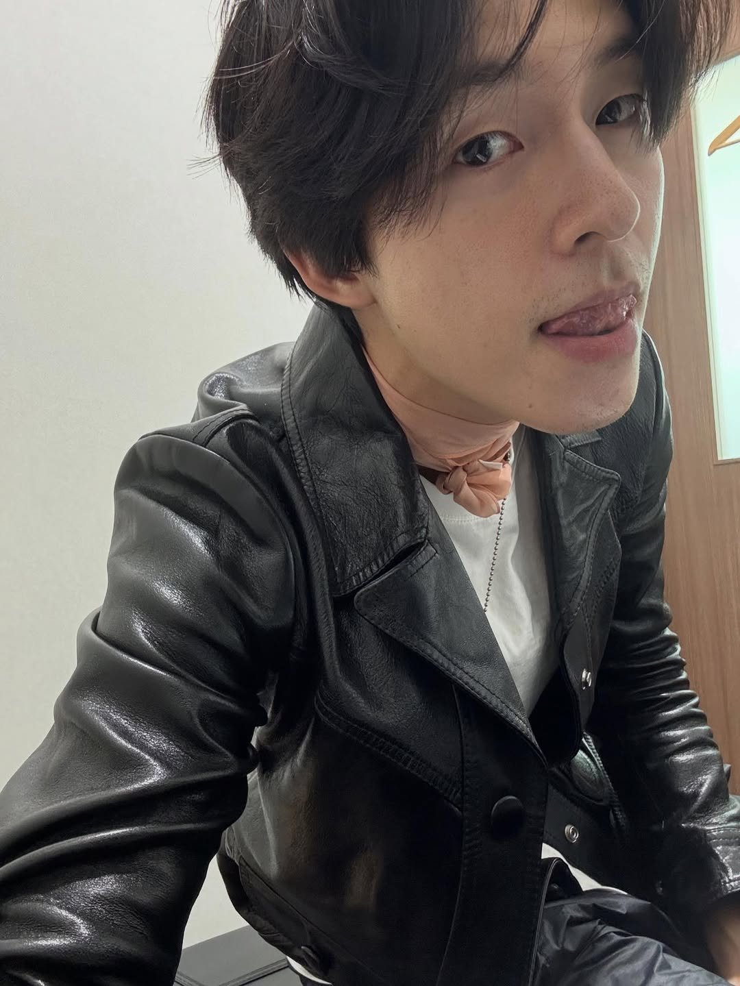 Photo by Hong Kyung on December 24, 2025. May be an image of one or more people, hair, bolo tie and text.