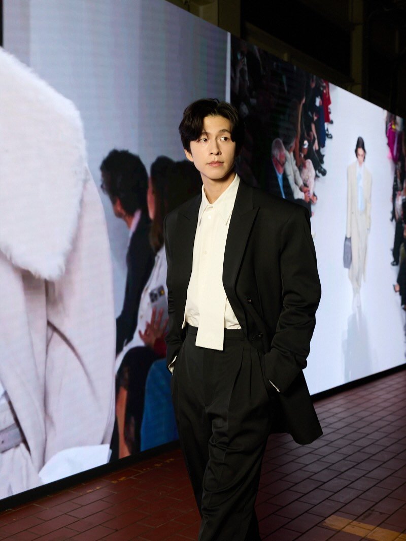 Photo shared by Hong Kyung on February 05, 2026 tagging @louise_trotter_. May be an image of overcoat, suit, dinner jacket and text.