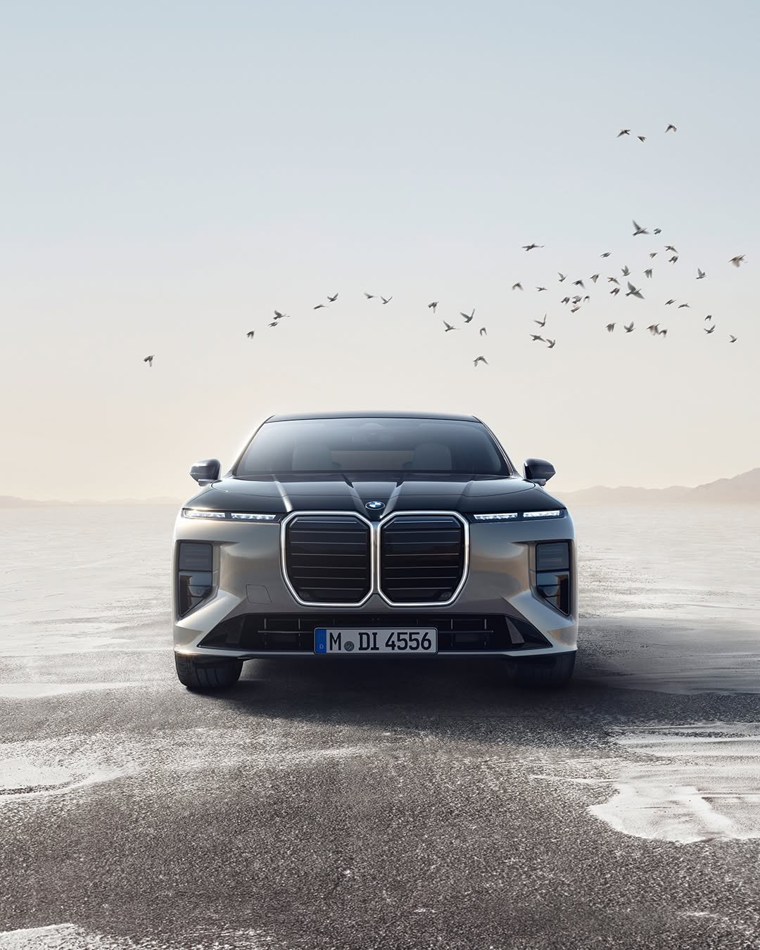 Photo shared by BMW on April 22, 2026 tagging @bmwgroup. May be an image of sedan, wheel, road and text.