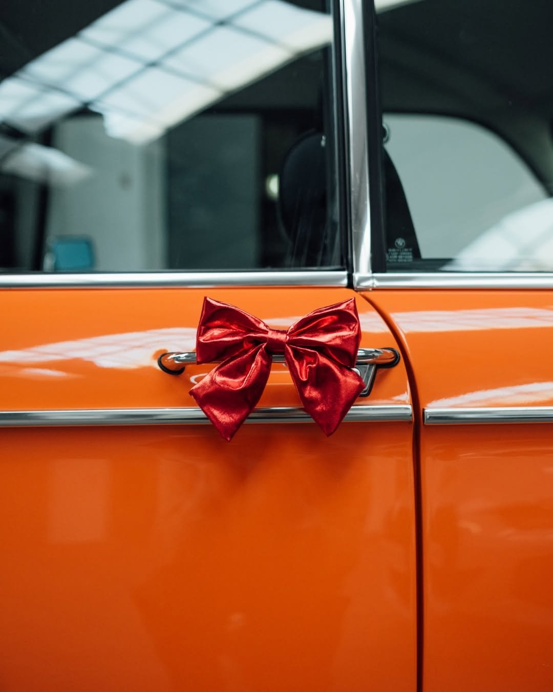 Photo by BMW on February 15, 2026. May be an image of rearview mirror, hood ornament, car and text.