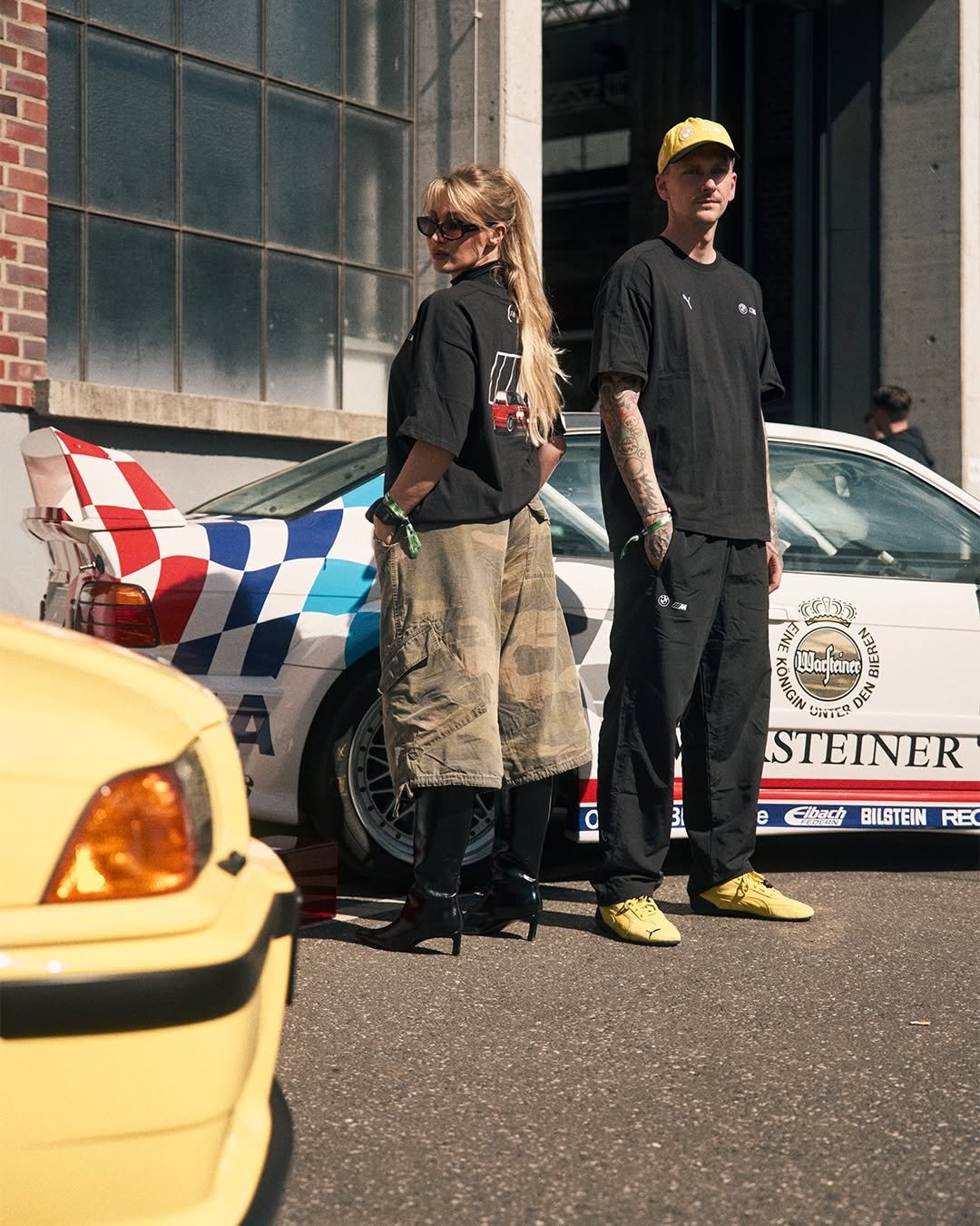 Photo shared by BMW M GmbH on April 26, 2026 tagging @willy, @jesuislerot, @hannaschoenwald, @bmwclassic, @bmwmmotorsport, @pumamotorsport, and @bmwlifestyle. May be an image of racing vehicles, kilt, street and text.