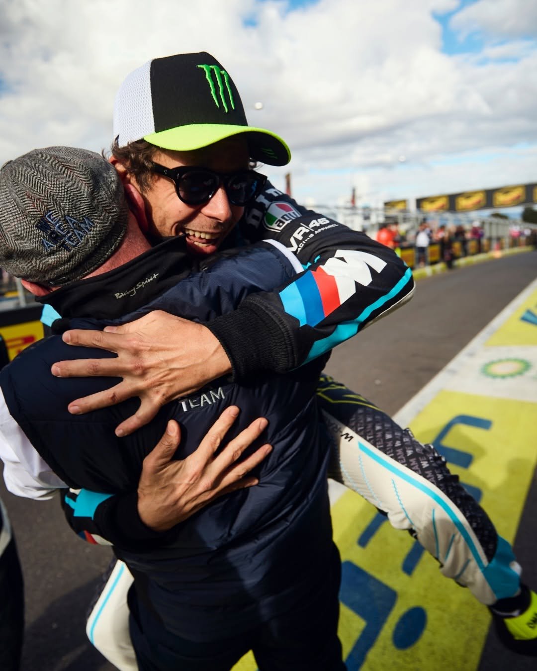 Photo by BMW M Motorsport 🏆 on February 15, 2026. May be an image of racing vehicles, helmet and text that says 'aqu 298 46 ลก ADS IEAM'.