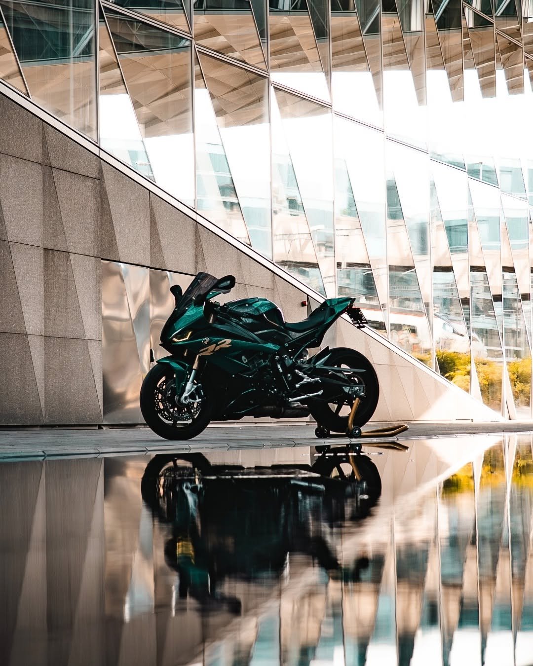Photo by BMW Motorrad on September 21, 2025. May be an image of racing vehicles, motorcycle, scooter and text.