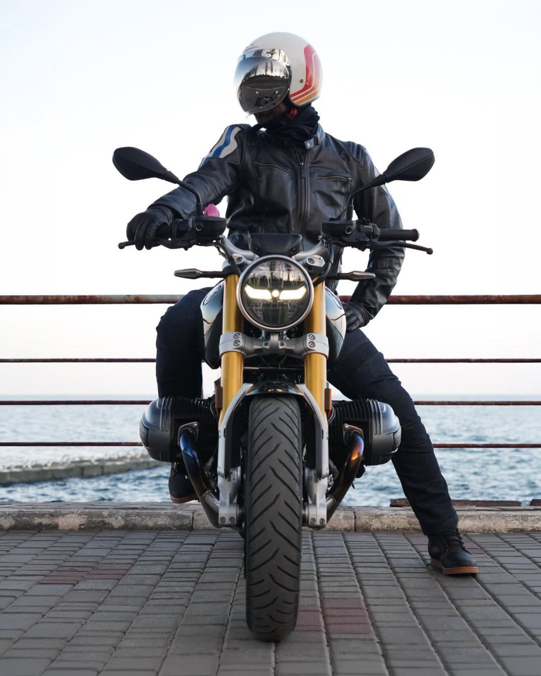 Photo by BMW Motorrad on April 23, 2026. May be an image of motorcycle, helmet and text.