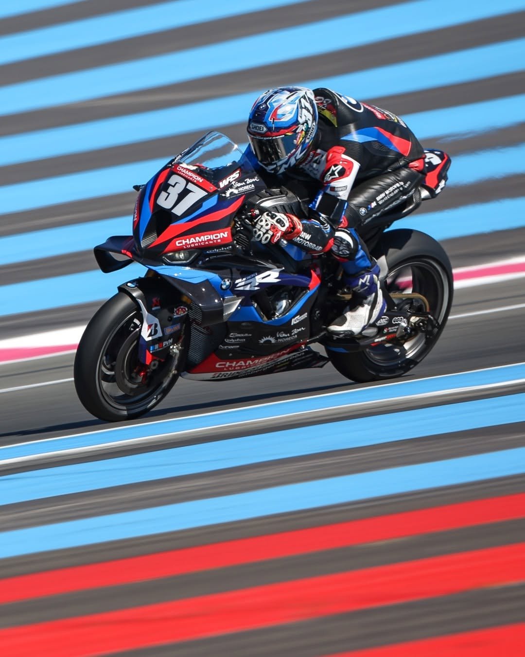 Photo shared by BMW Motorrad on September 22, 2025 tagging @bmwmotorradmotorsport. May be an image of 1 person, racing a vehicle, motorcycle, helmet and text.