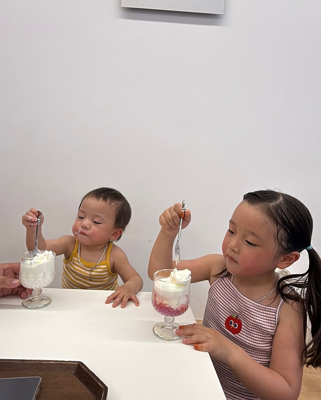 Photo shared by 석아영 on August 01, 2025 tagging @blushaak__coffee. May be an image of 2 people, baby, ice cream, gelato and text.