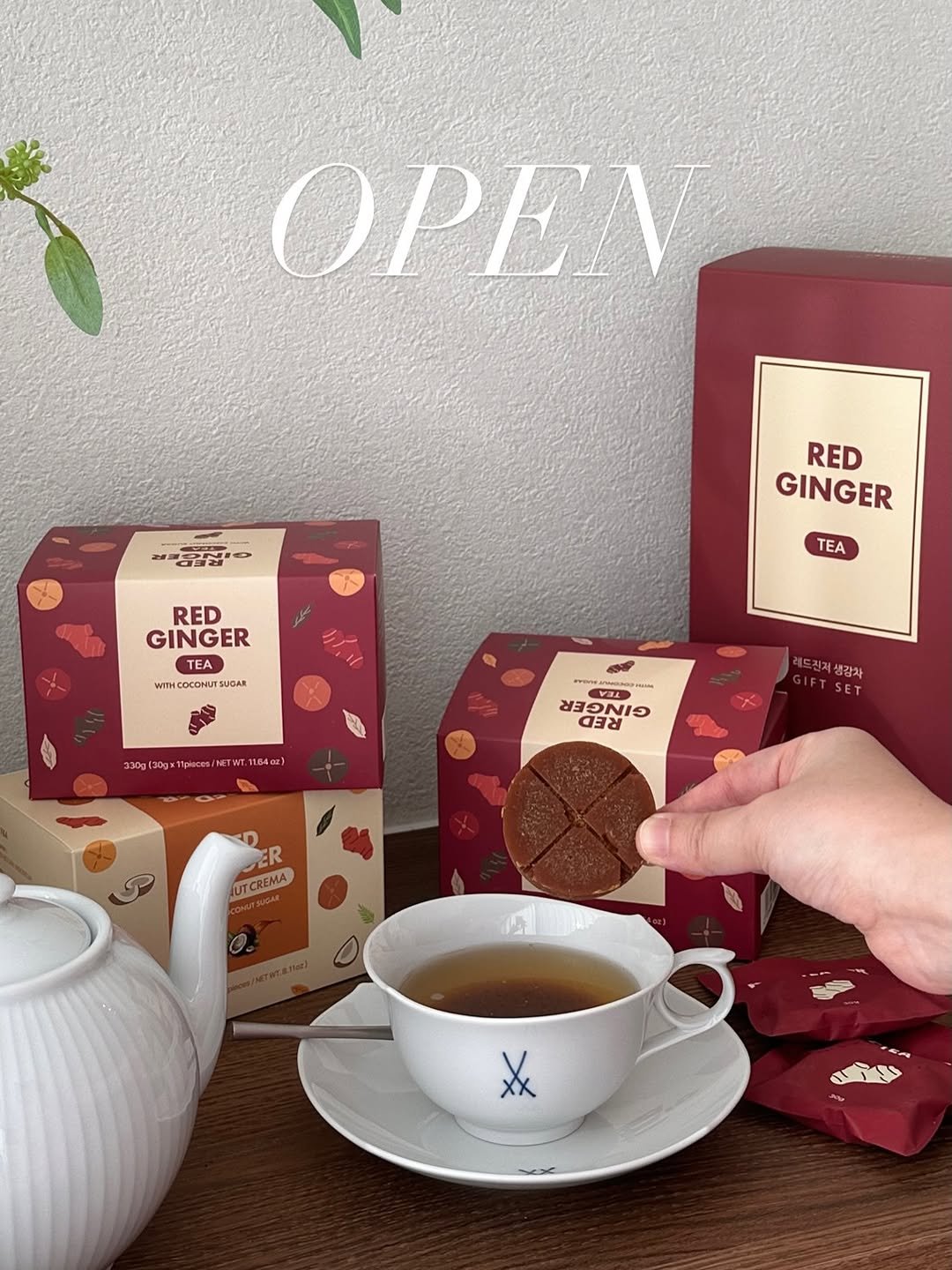 Photo by 밥설공주 on December 21, 2025. May be an image of ‎tea, oatmeal cookies, wafer and ‎text that says '‎OPEN 레.밥 RED GINGER RED GINGER TEA WTH.COCOMUT.SUGAR cocoHиT AGAR WTTH TEA 330g|30gx1 Mpieces/ 16402] T Kpoma M SE ۲۲ي หลอู VIA FED GNIC 드친지생강차 GIFTSET R JUTCREMA ॐ XX‎'‎‎.