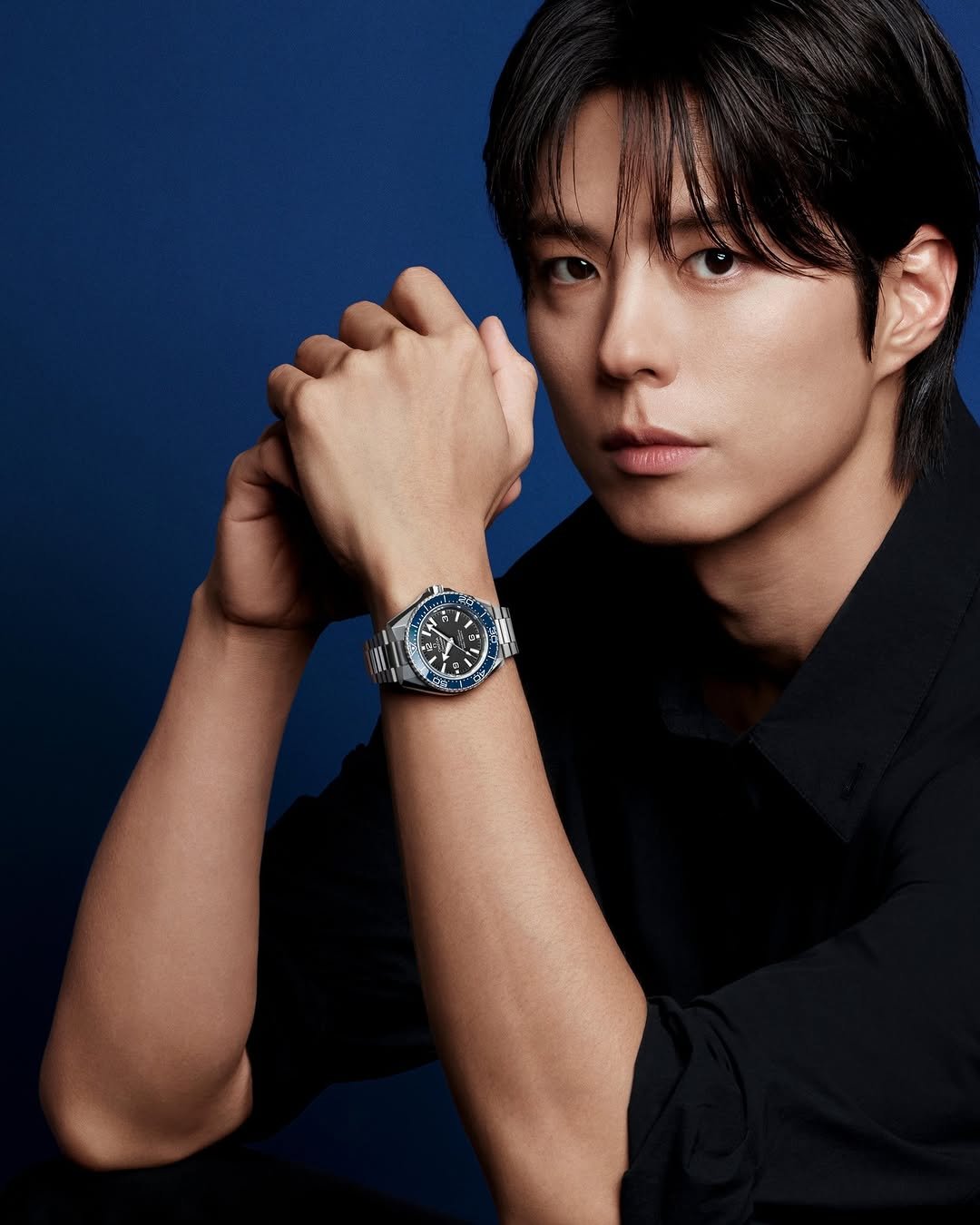 Photo shared by OMEGA on December 16, 2025 tagging @bogummy. May be an image of wrist watch and text.