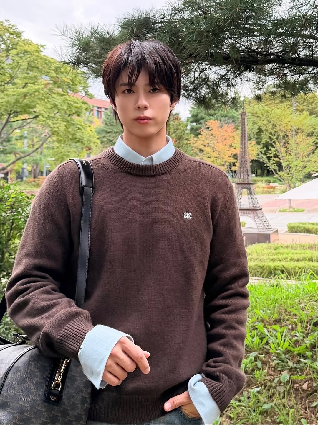 Photo shared by 박보검 PARK BO GUM on October 15, 2025 tagging @celine. May be an image of one or more people, hair, bolo tie, top and text.
