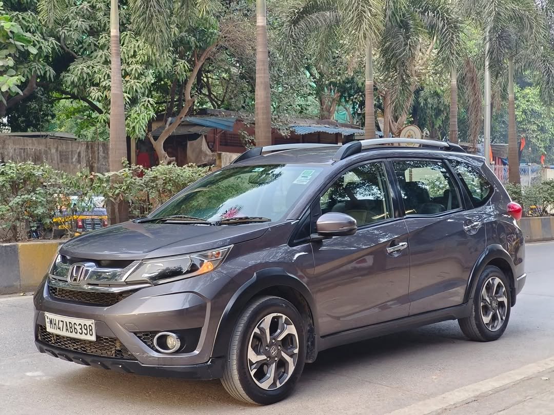 Photo by BOMBAY MOTORS on December 23, 2025. May be an image of wheel, minivan, sedan and text.