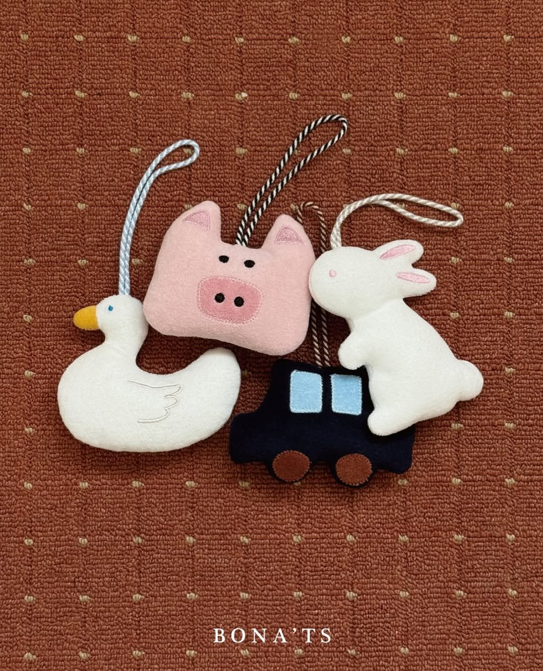 Photo shared by 보나츠 on December 28, 2025 tagging @from2y, @blinding_deun, @bbombbom_25, @kkomeong1013, @ririkimm, @stellar.uranus, @hug_mnd, and @kkakkong_2. May be an image of duck, toy and text that says 'BONA'TS TS'.