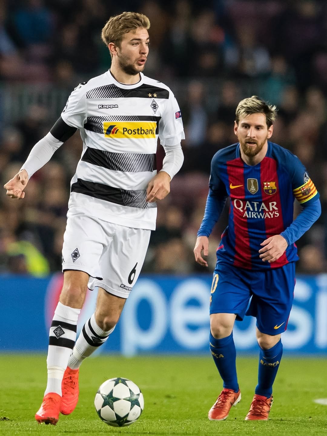 Photo shared by Borussia Mönchengladbach | Bundesliga on February 19, 2026 tagging @chrikra23. May be an image of ‎football, soccer, cleats, ball, stadium and ‎text that says '‎Kappa Postbani QATAR AIRWAYS Kapo ε ألس‎'‎‎.