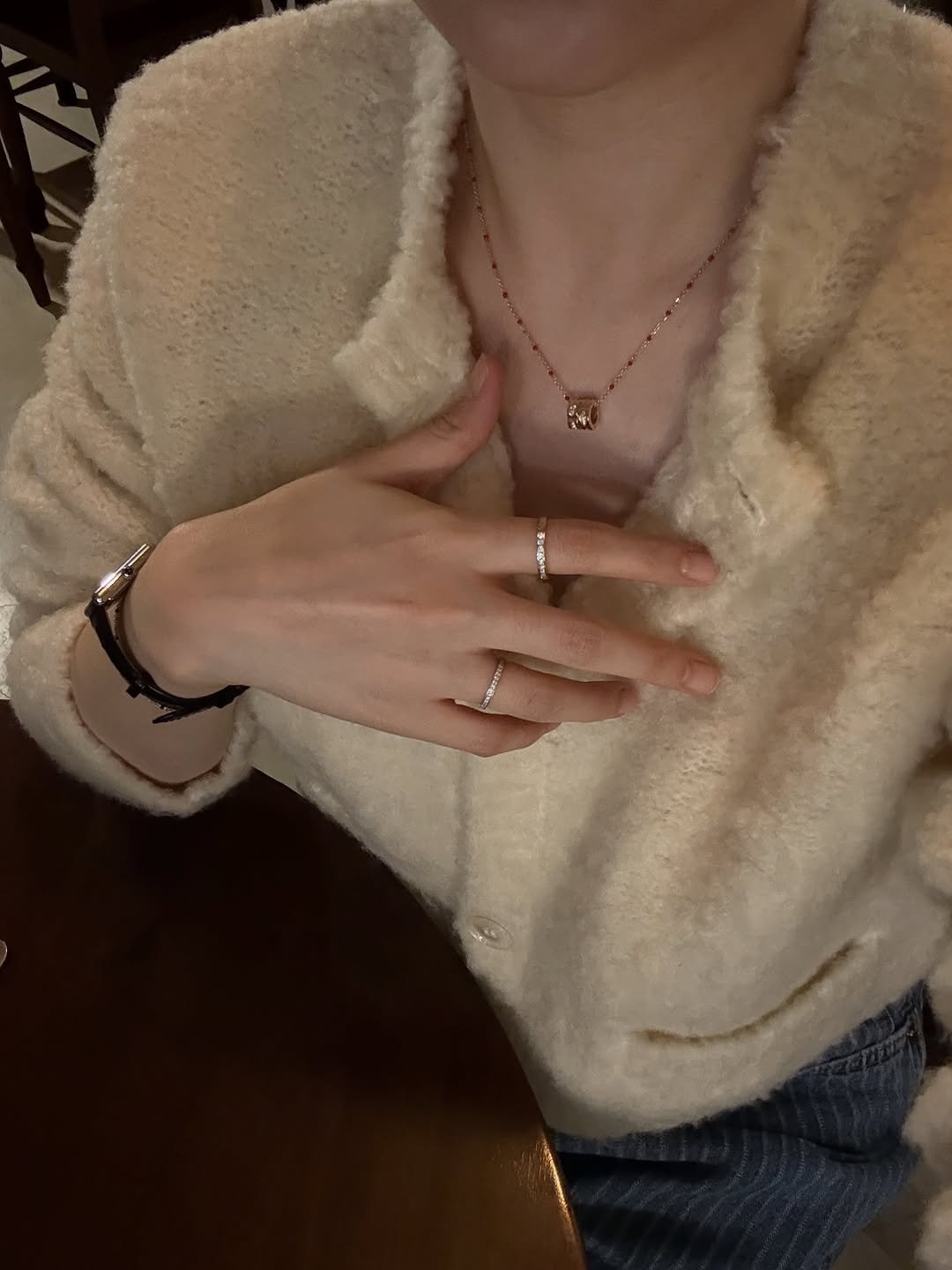 Photo by 주얼리 브랜드 보스크_BOSQUE on November 09, 2025. May be an image of ring, duffle coat, necklace and text.