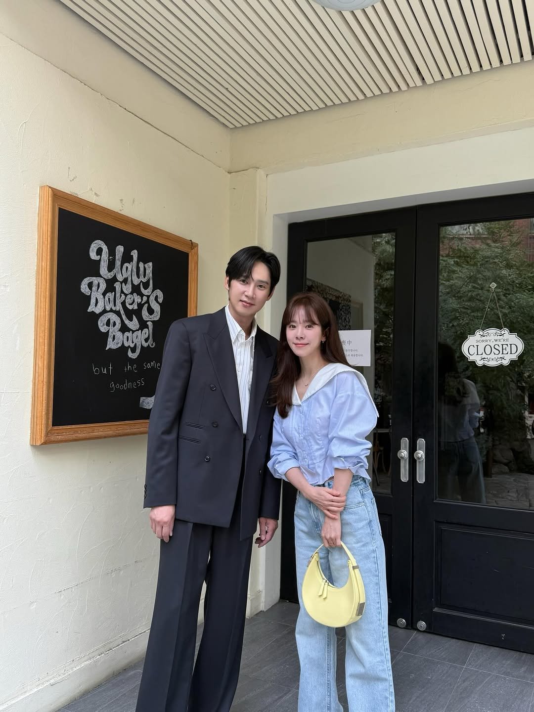 Photo by 박스아범 박성훈 on March 21, 2026. May be an image of duffle coat, bolo tie, blazer, suit and text.