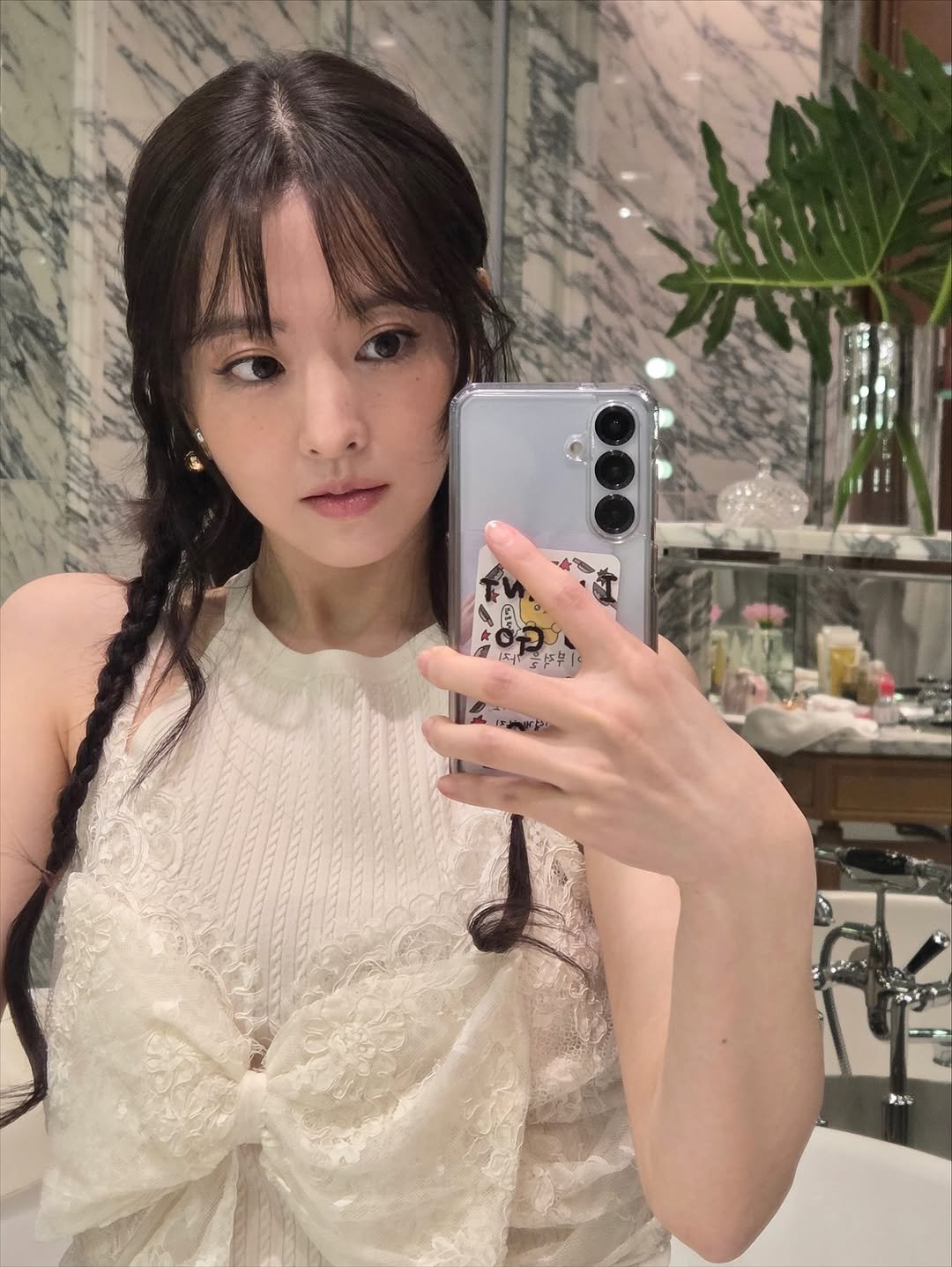 Photo by 박보영 ParkBoYoung on November 15, 2025. May be a selfie of one or more people, braids, phone, mirror, top and text.