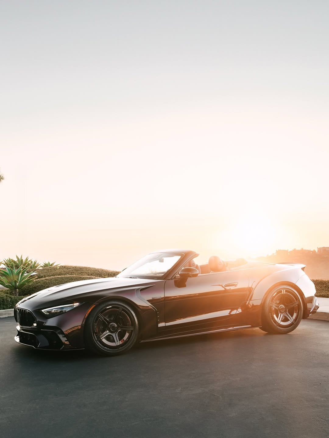 Photo by BRABUS on January 05, 2026. May be an image of roadster, convertible, wheel, race car, road and text.