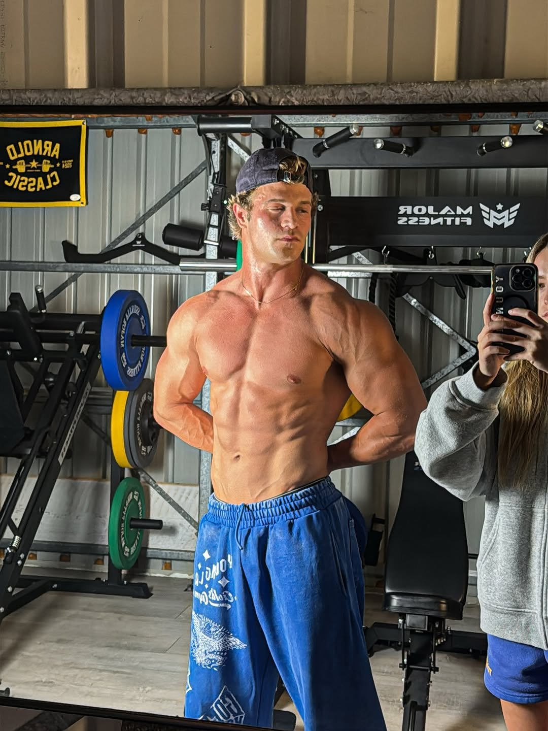 Photo by Brandon Starr on November 30, 2025. May be an image of one or more people, biceps, people bodybuilding and text.