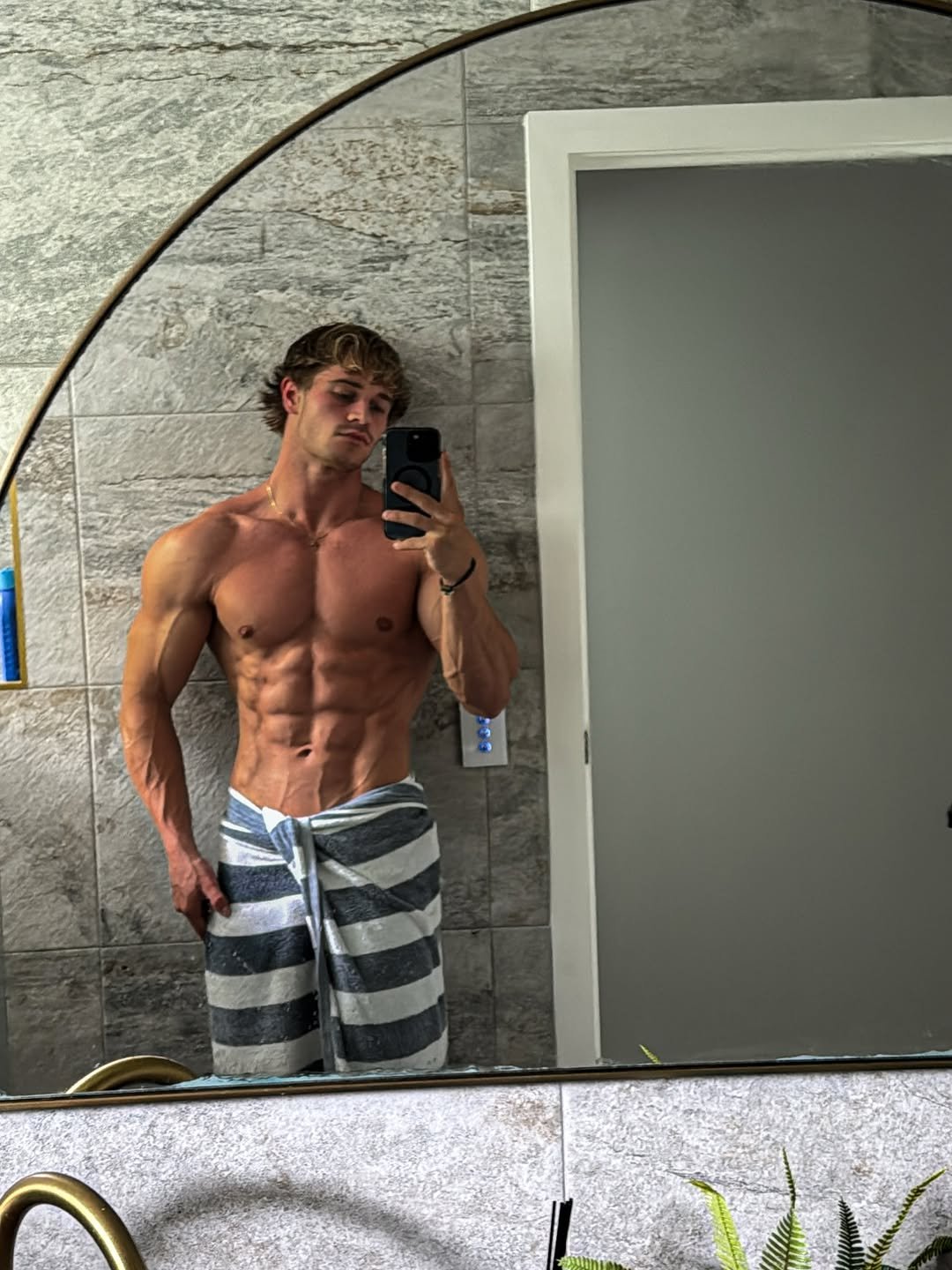 Photo by Brandon Starr on January 12, 2026. May be a selfie of one or more people, biceps, people bodybuilding and text.