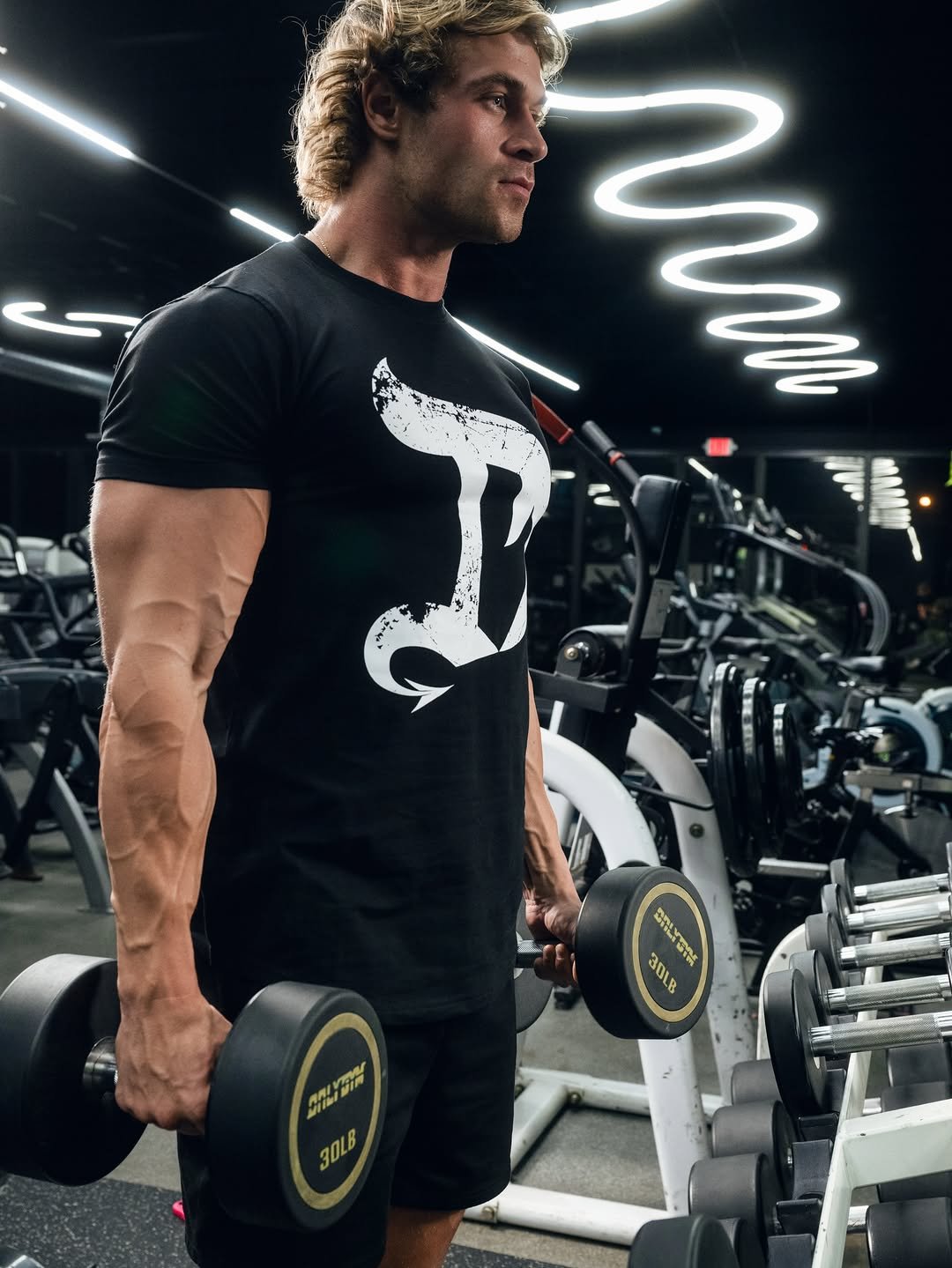 Photo shared by Brandon Starr on November 25, 2025 tagging @dragonpharma_llc. May be an image of one or more people, biceps, people bodybuilding, activewear, dumbbell, sportswear, barbell and text.